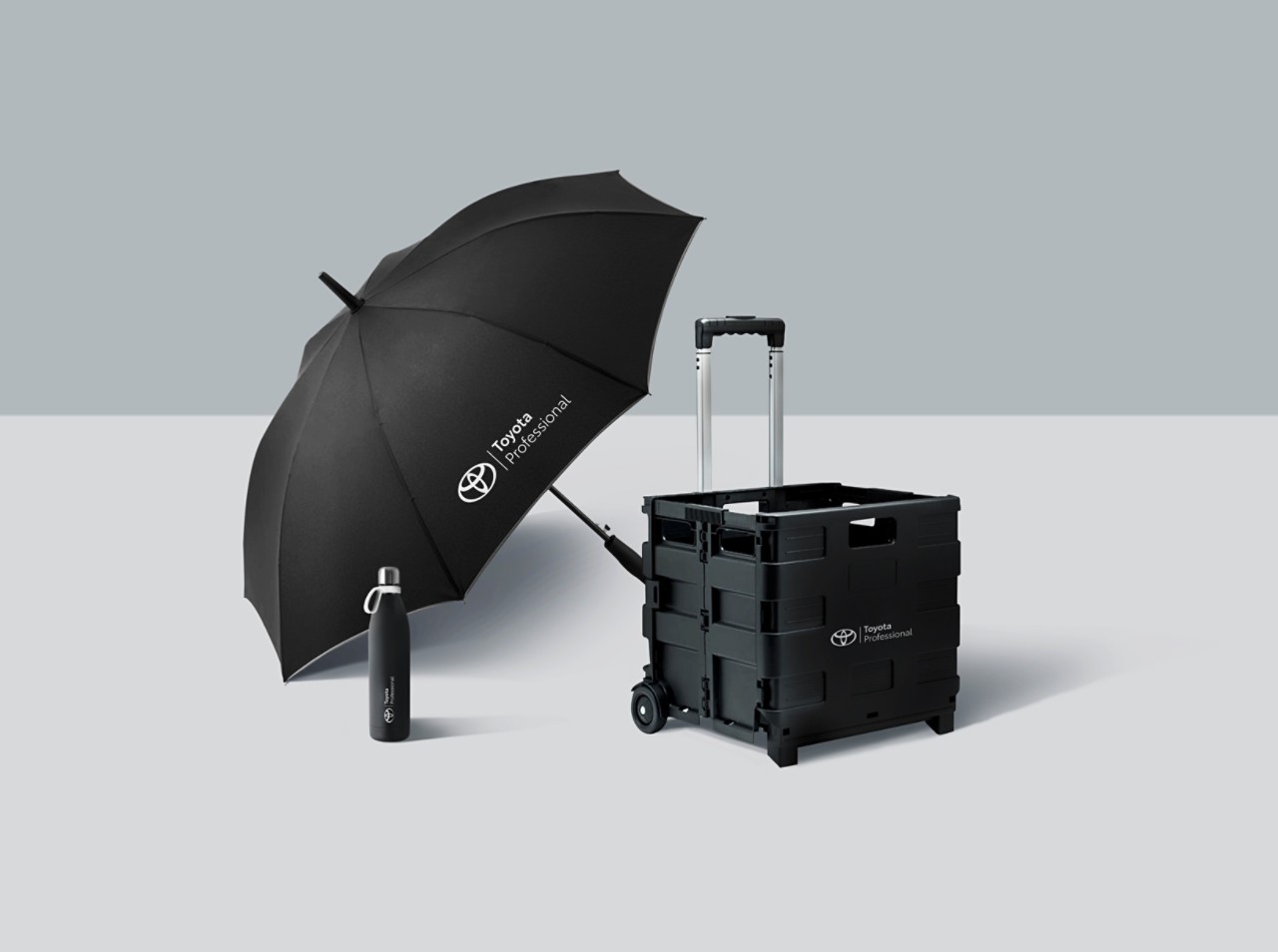 Toyota Professional zīmola lietussargs, ūdens pudele un ratiņi